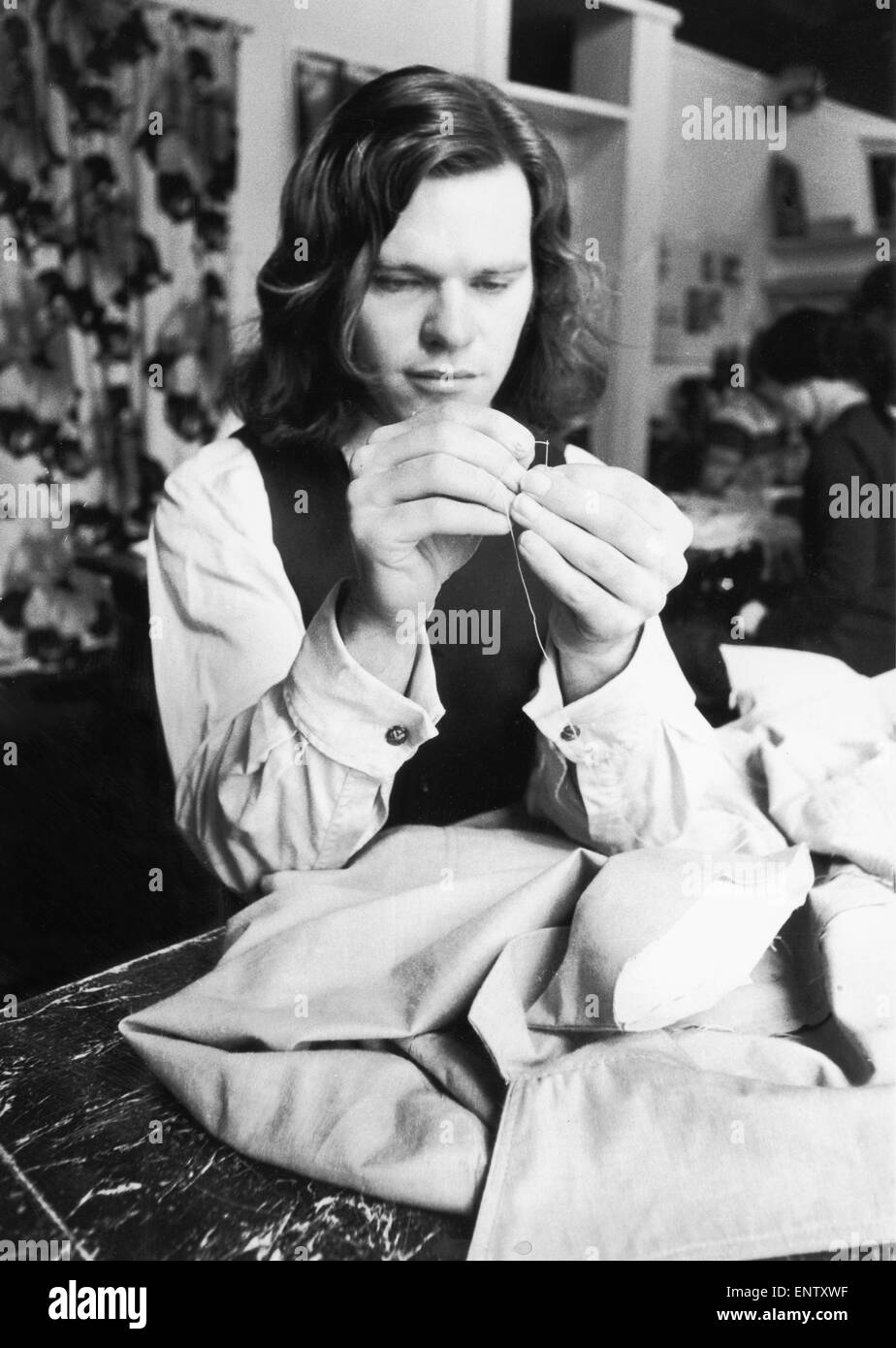 Labourer Alan Howse put down his pick and shovel and reached for a needle and thread. Now he's a star at Edinburgh's sewing school in Howe Street. The only man in a class of girls. Alan 23 from Edinburgh is making a Jacket to save money. 16th April 1975 Stock Photo