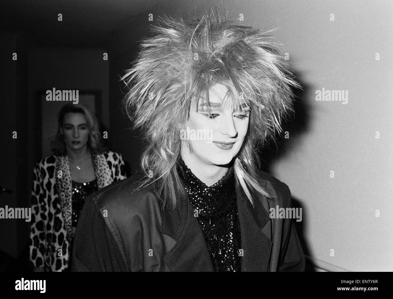 Culture Club singer Boy George arriving for the premiere of the film '1984'. Arriving 20 mins late accompanied by his friend Marilyn, he was sporing a vivid purple hairstyle. 7th October 1984. Stock Photo