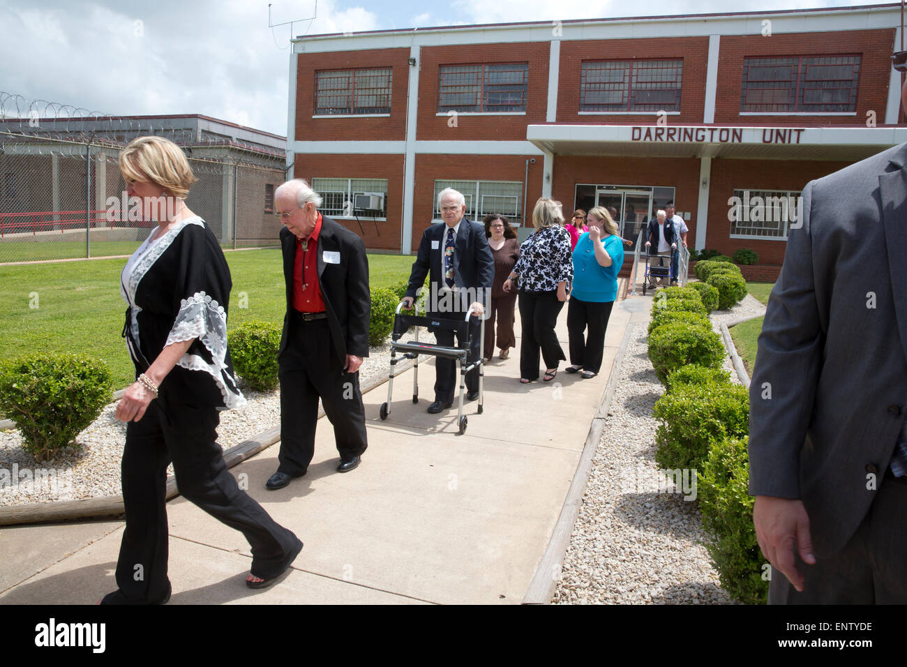 Guests arrive to the Darrington Unit prison in Rosharon, Texas to
