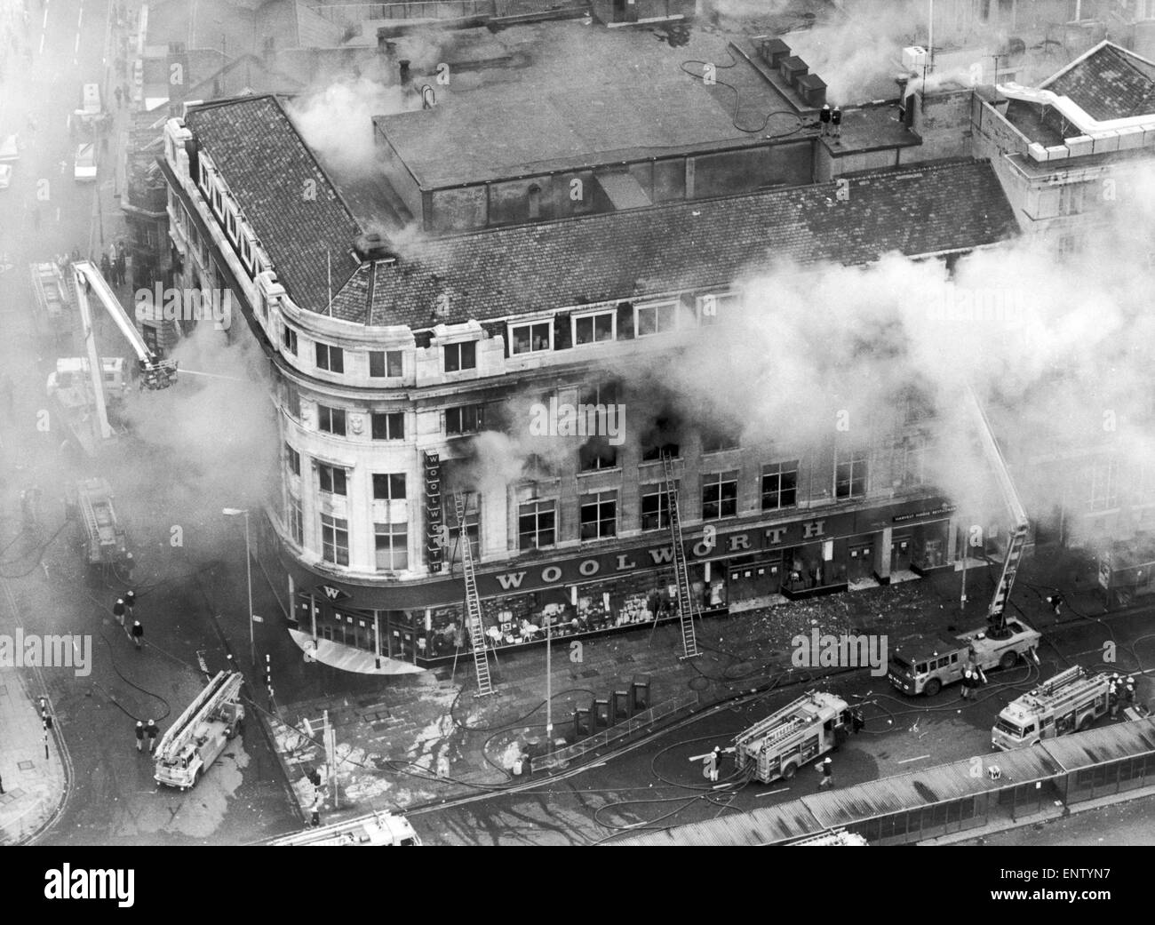 Aerial view of fire at Woolworths departent store in central Manchester, Tuesday 8th May 1979. The store was the largest Woolworths in Europe, with six floors plus two basement levels. The fire, which started in the second floor furnishing department, killed nine shoppers and one member of staff. It is believed that the fire was started by a damaged electrical cable, which had furniture stacked in front of it. Stock Photo
