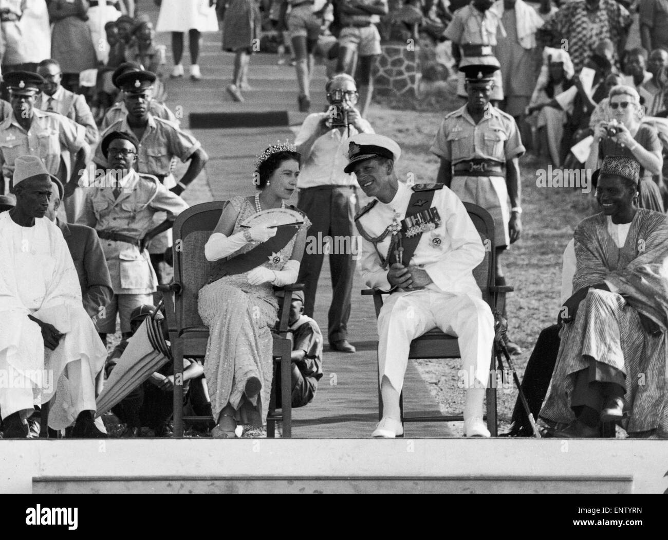The Queen and The Duke of Edinburgh at an open-air dancing display during their tour of South Africa. 1961 Stock Photo