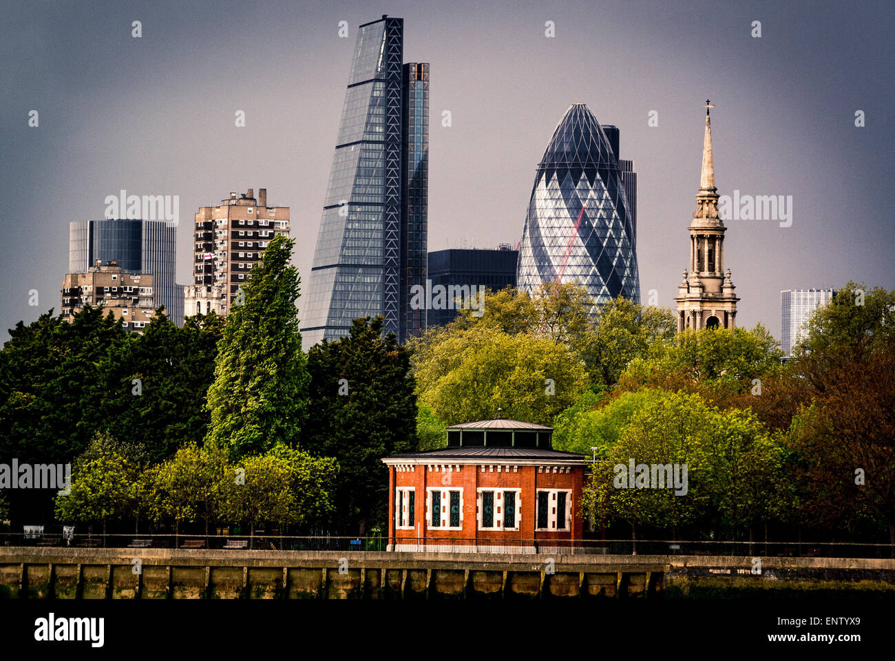 The Gherkin and Cheese Grater buildings from south side of river Thames, Air shaft to Rotherhithe Tunnel Stock Photo