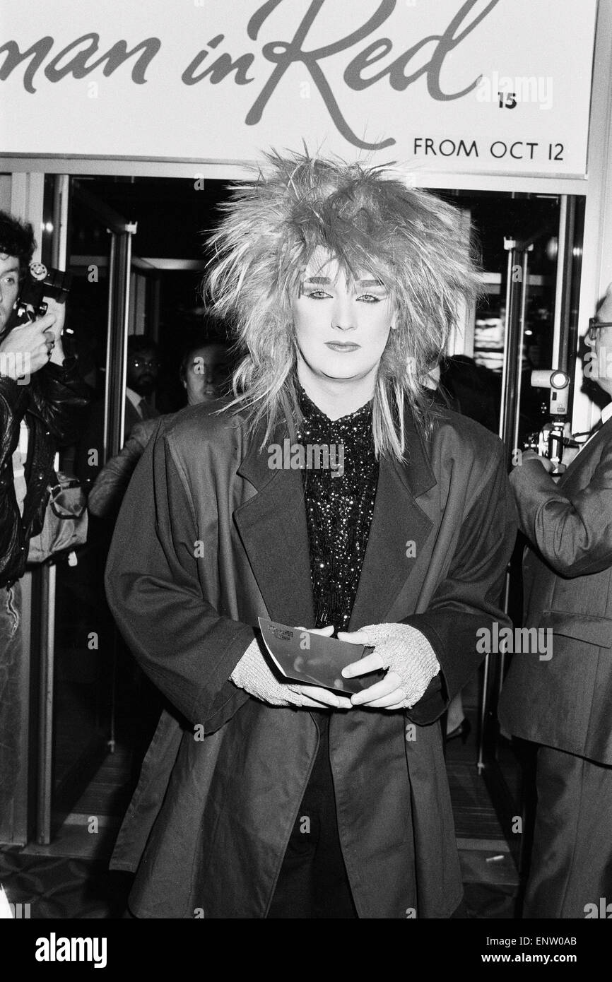 Culture Club singer Boy George arriving for the premiere of the film '1984'. Arriving 20 mins late accompanied by his friend Marilyn, he was sporing a vivid purple hairstyle. 7th October 1984. Stock Photo