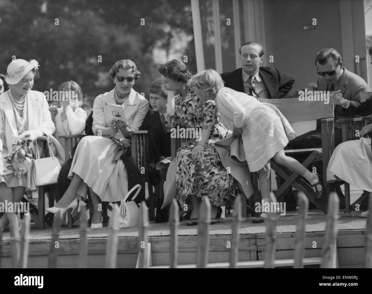 Queen Ingrid of Denmark watching Polo with The Queen, Prince Charles and Princess Anne at Windsor Great Park. 24th June 1957. Stock Photo