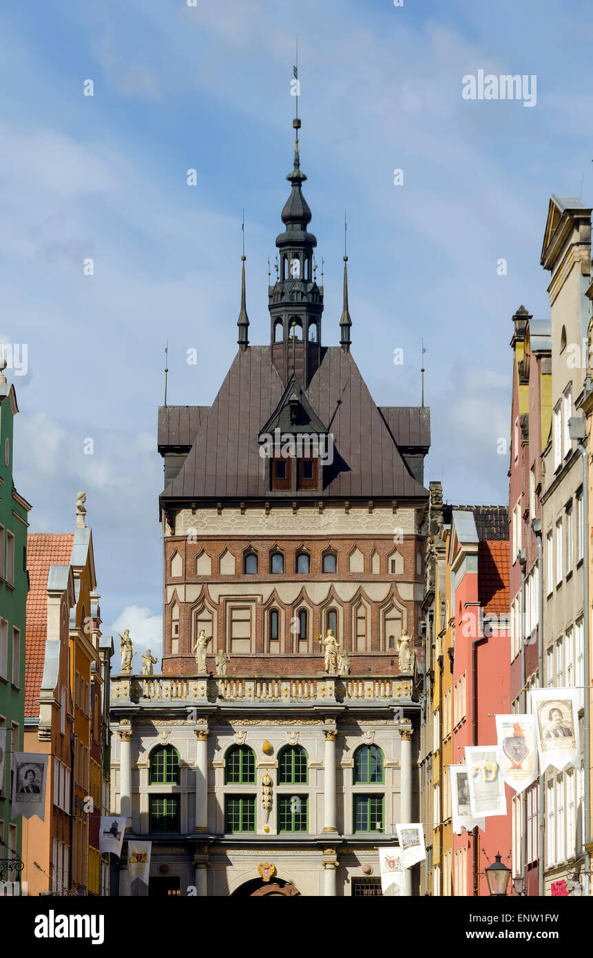 Ul Dluga Street (Long Street, The Royal Way) historic tenement houses facing The Golden Gate old town entrance Gdansk Poland Stock Photo