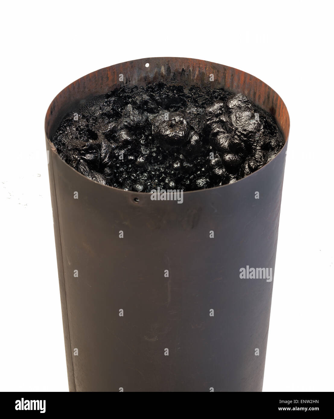 Dangerous accumulation of Creosote in a Wood Stove Chimney Pipe. Stock Photo