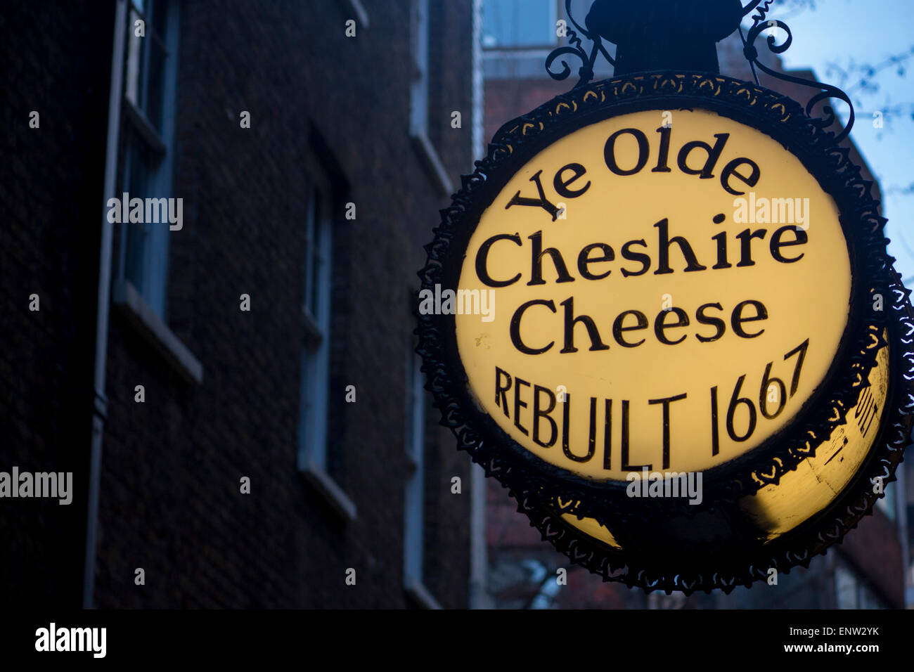 Ye Olde Cheshire Cheese traditional circular pub sign at dusk twilight night Fleet Street City of London England UK Stock Photo