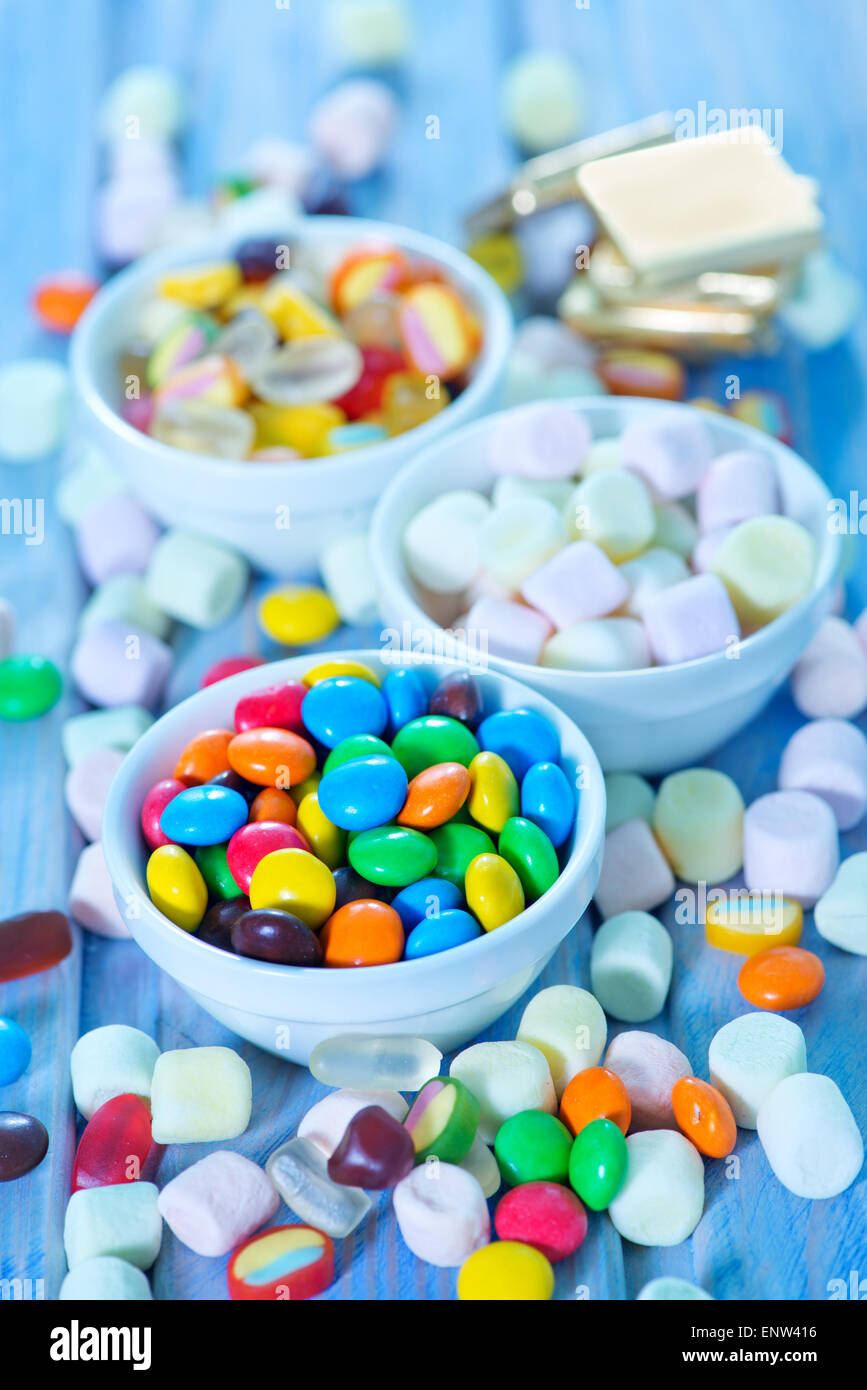 color candy in bowl and on a table Stock Photo Alamy
