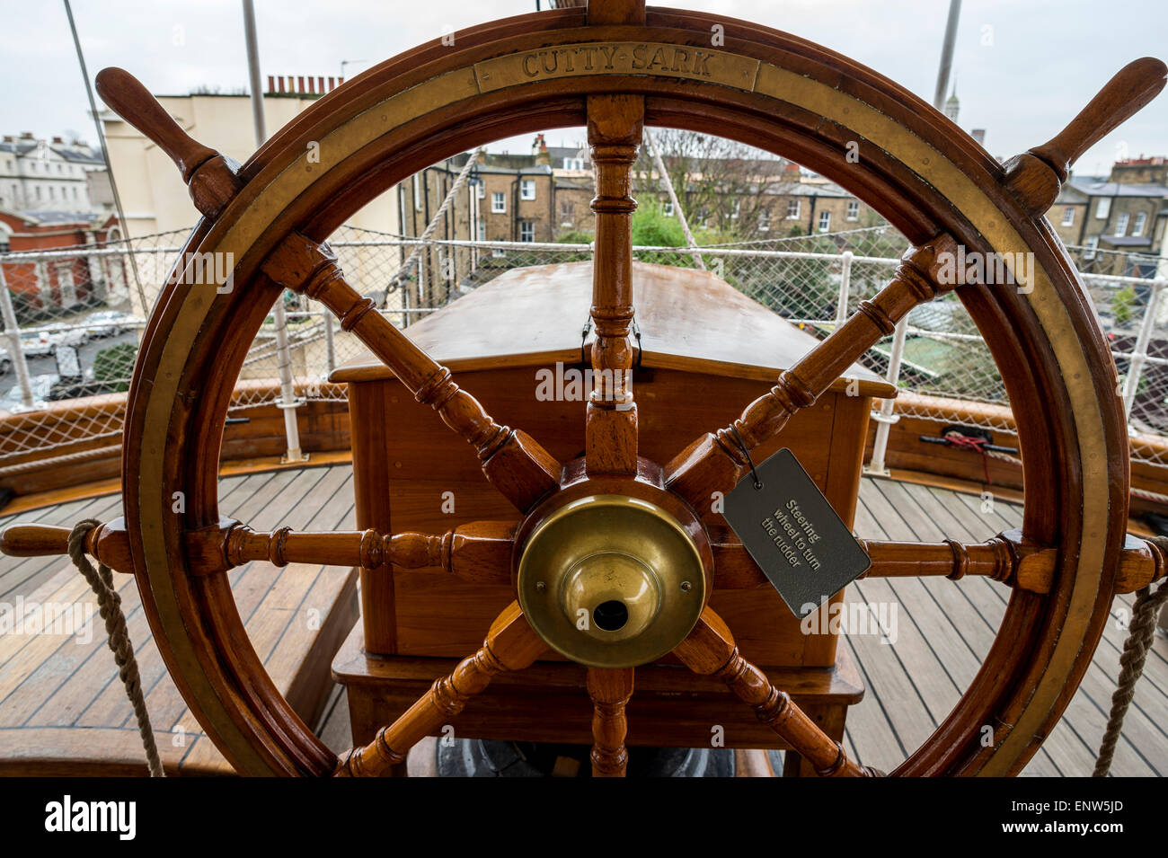 Ship's Wheel Against Water Stock Photo by mrdoomits