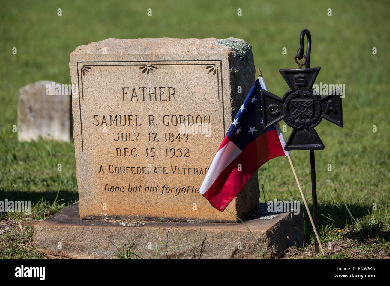 The grave marker of a civil war confederate veteran at Elmwood Cemetery