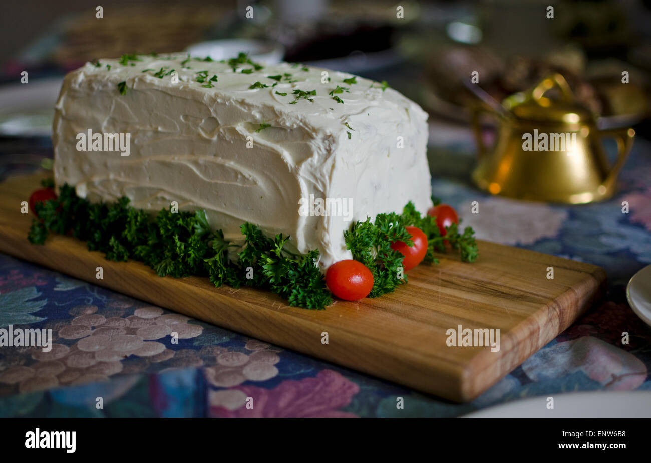 Delicious ham and egg layered sandwich loaf with cream cheese. On a