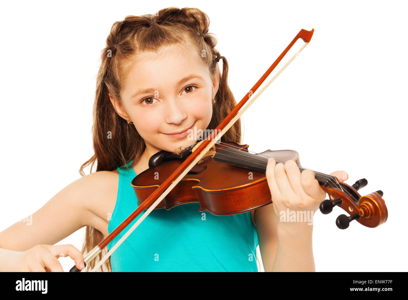 Beautiful girl with long hair playing on violin Stock Photo - Alamy