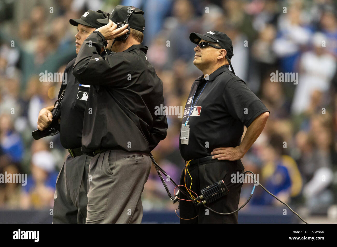 Milwaukee, WI, USA. 11th May, 2015. Umpires wait for the replay before upholding the call at home plate the Major League Baseball game between the Milwaukee Brewers and the Chicago White Sox at Miller Park in Milwaukee, WI. John Fisher/CSM/Alamy Live News Stock Photo