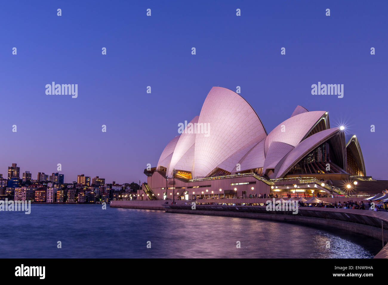 Sydney Opera House in Sydney Harbour, Sydney, New South Wales, Australia at sunset Stock Photo