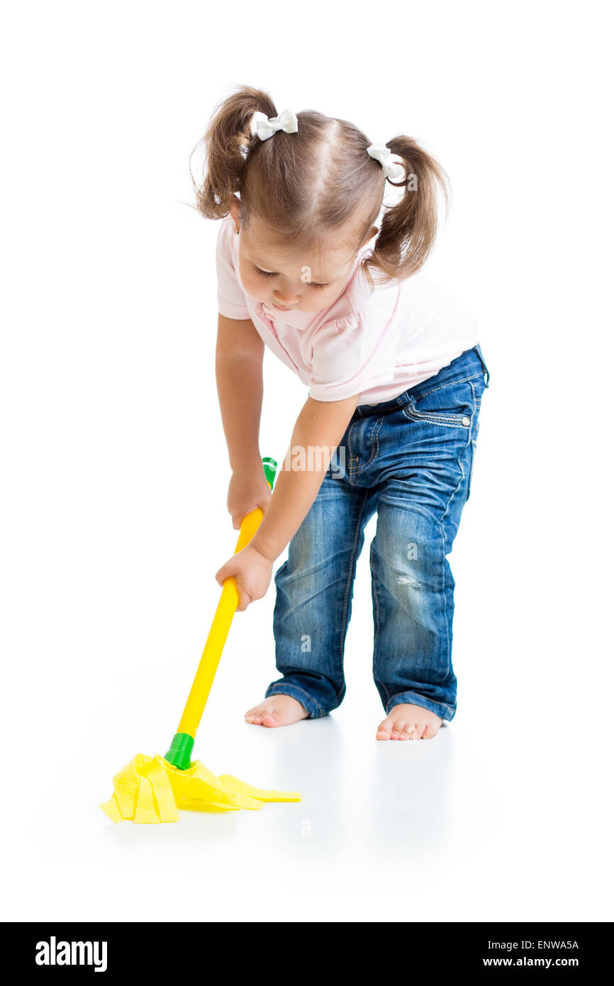 Little girl doing playing and mopping the floor Stock Photo