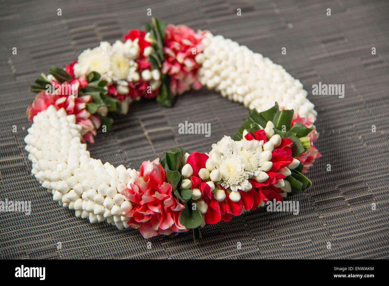 Thai traditional craft flower garland on wood background Stock Photo ...