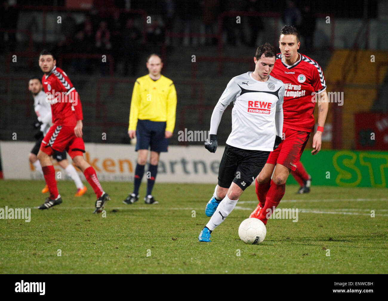 sports, football, Regional League West, 2014/2015, Rot Weiss Oberhausen versus SG Wattenscheid 09 0:1, Stadium Niederrhein in Oberhausen, scene of the match, f.l.t.r. Alexander Scheelen (RWO), referee Fabian Maibaum, Stefan Grummel (09), David Jansen (RWO) Stock Photo