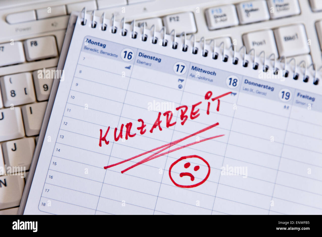 Shorttime work entry in a diary Stock Photo Alamy