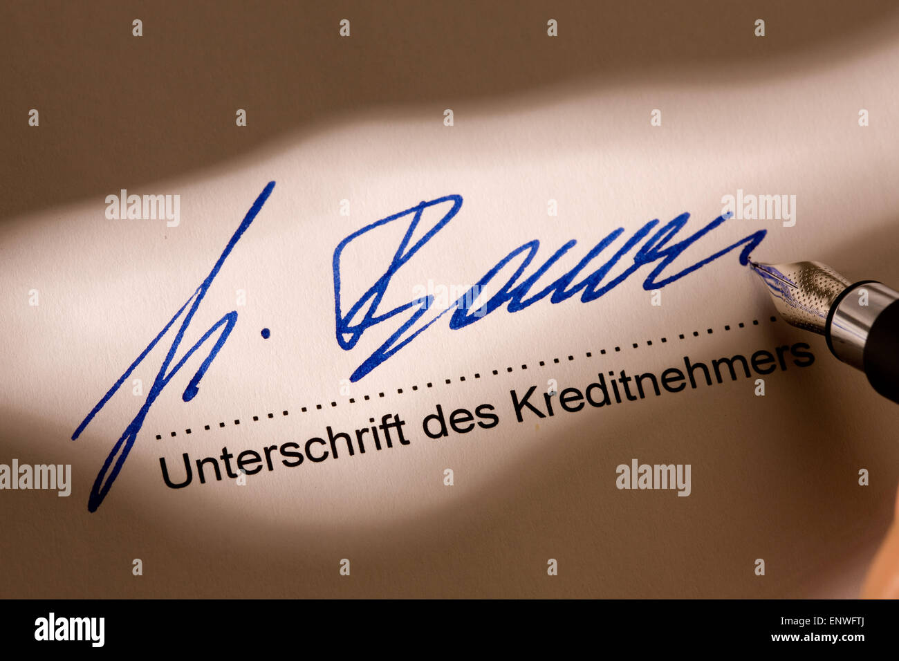 Signature for credit on German contract Stock Photo