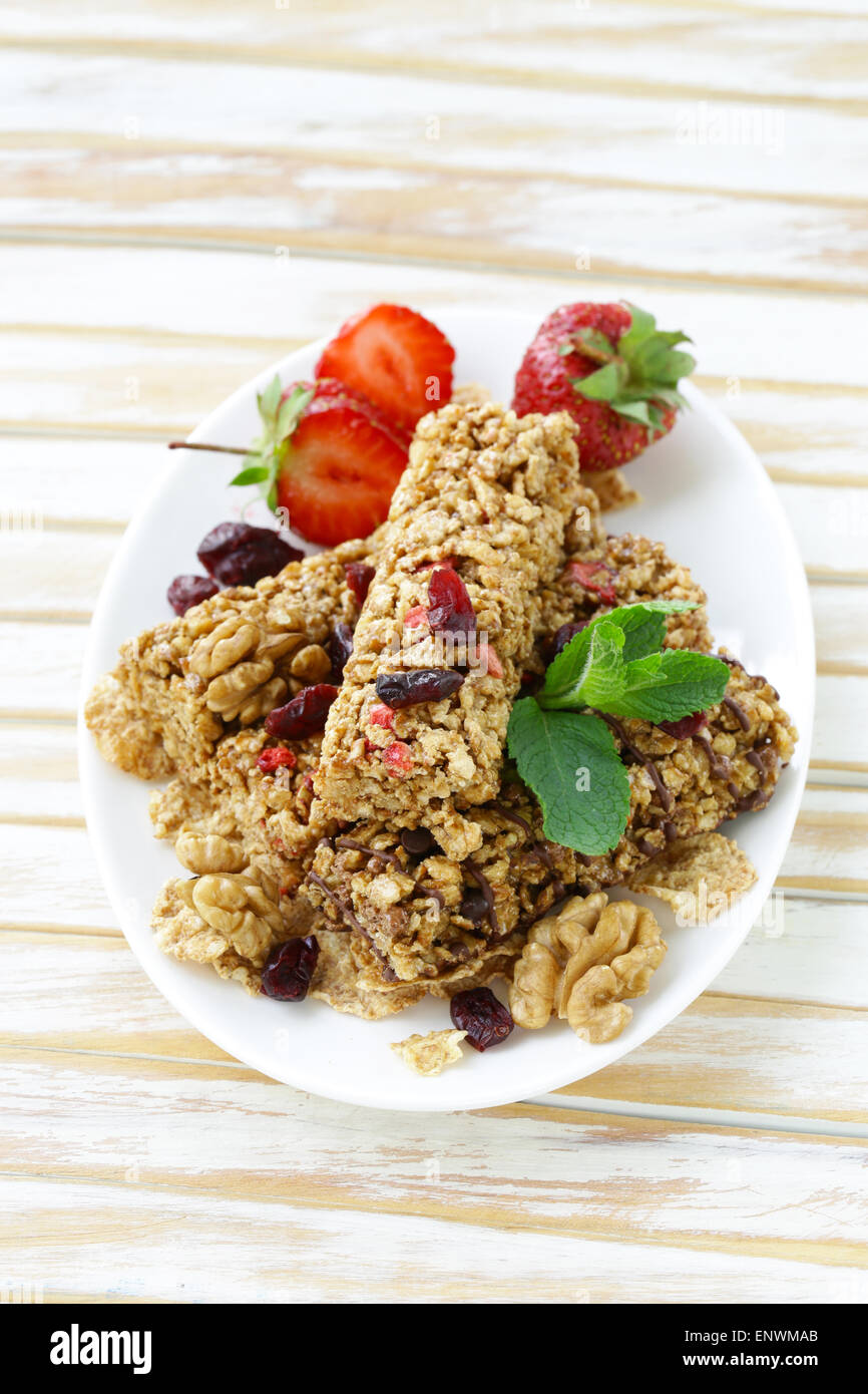 homemade muesli bars with cranberries, nuts and chocolate Stock Photo