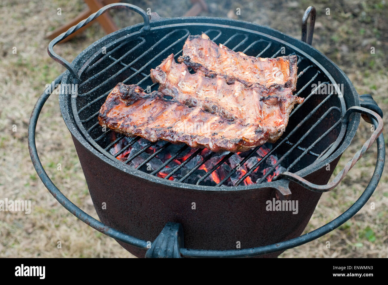 Shot of preparing grilled ribs in outside Stock Photo