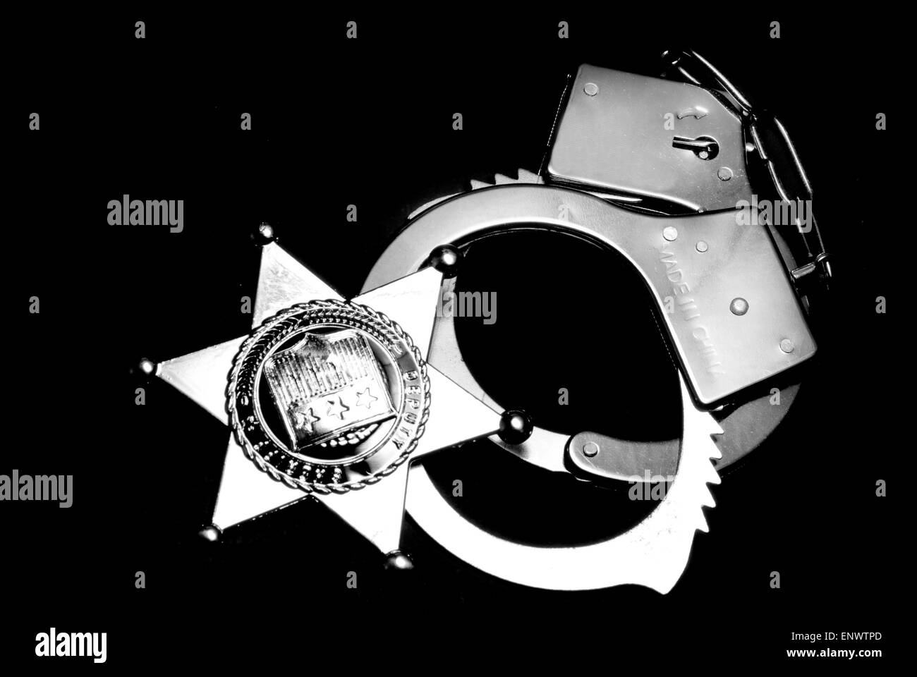 Police badge handcuffs hires stock photography and images Alamy