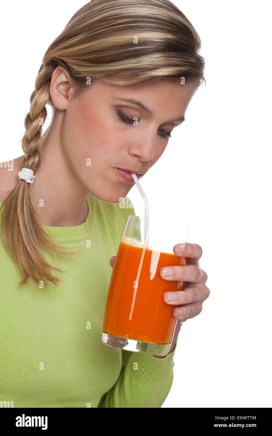 Healthy lifestyle series - Woman drinking carrot juice Stock Photo