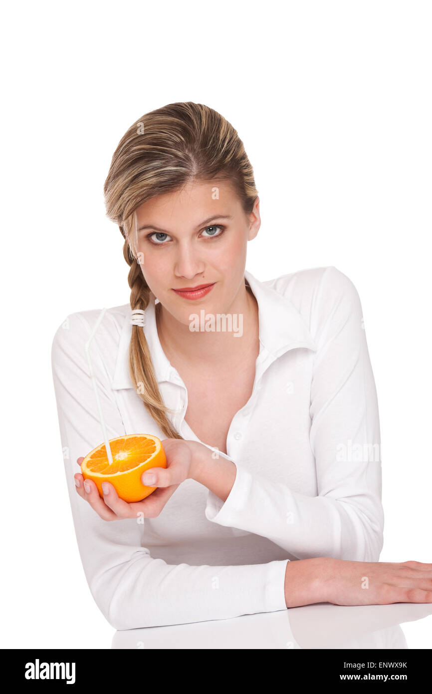 Healthy lifestyle series - Woman holding orange Stock Photo - Alamy