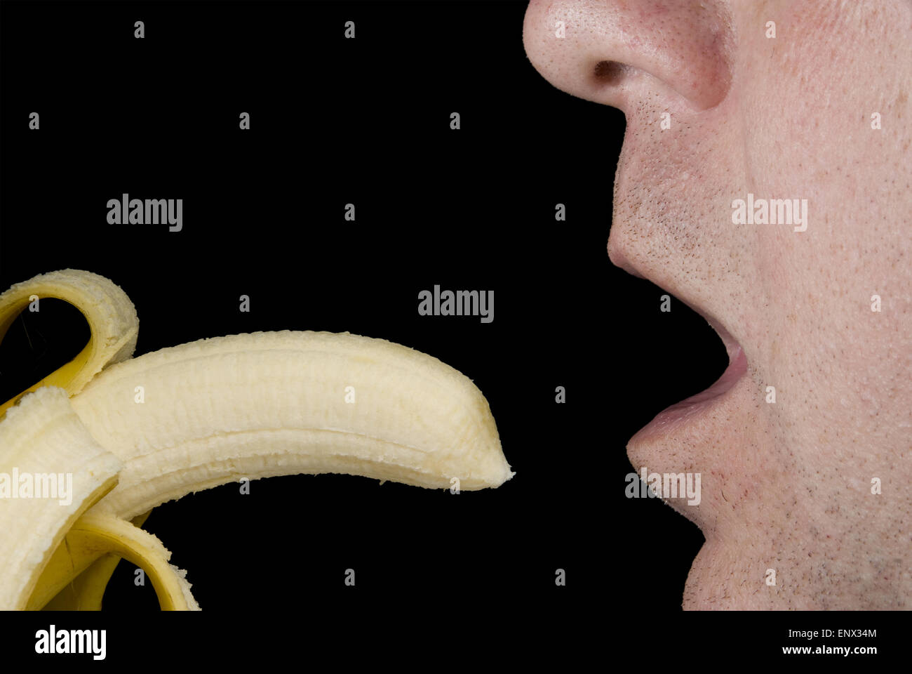 Eating a Banana Stock Photo - Alamy