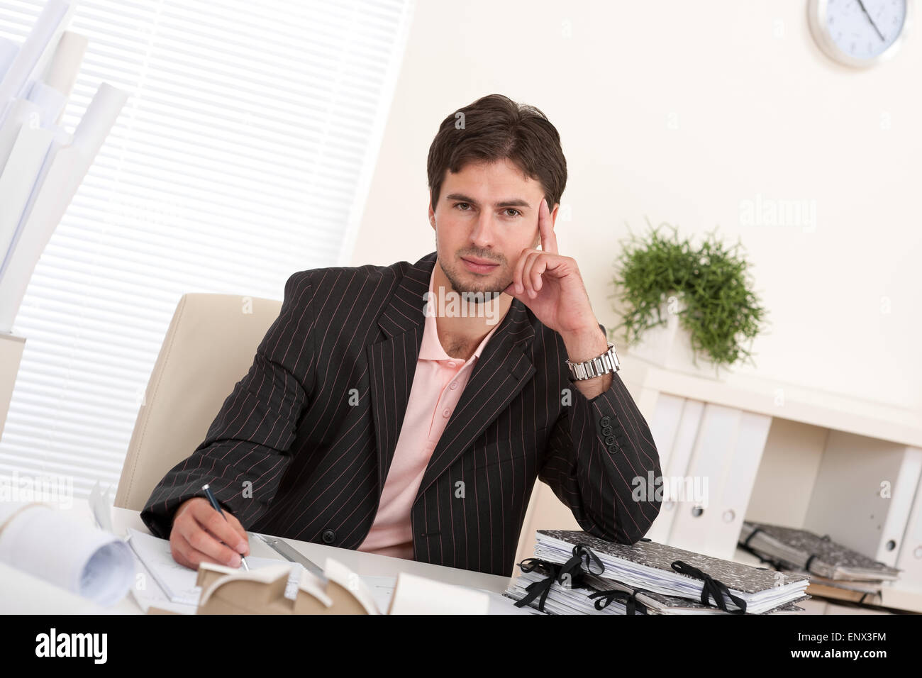 Successful professional businessman working at office Stock Photo
