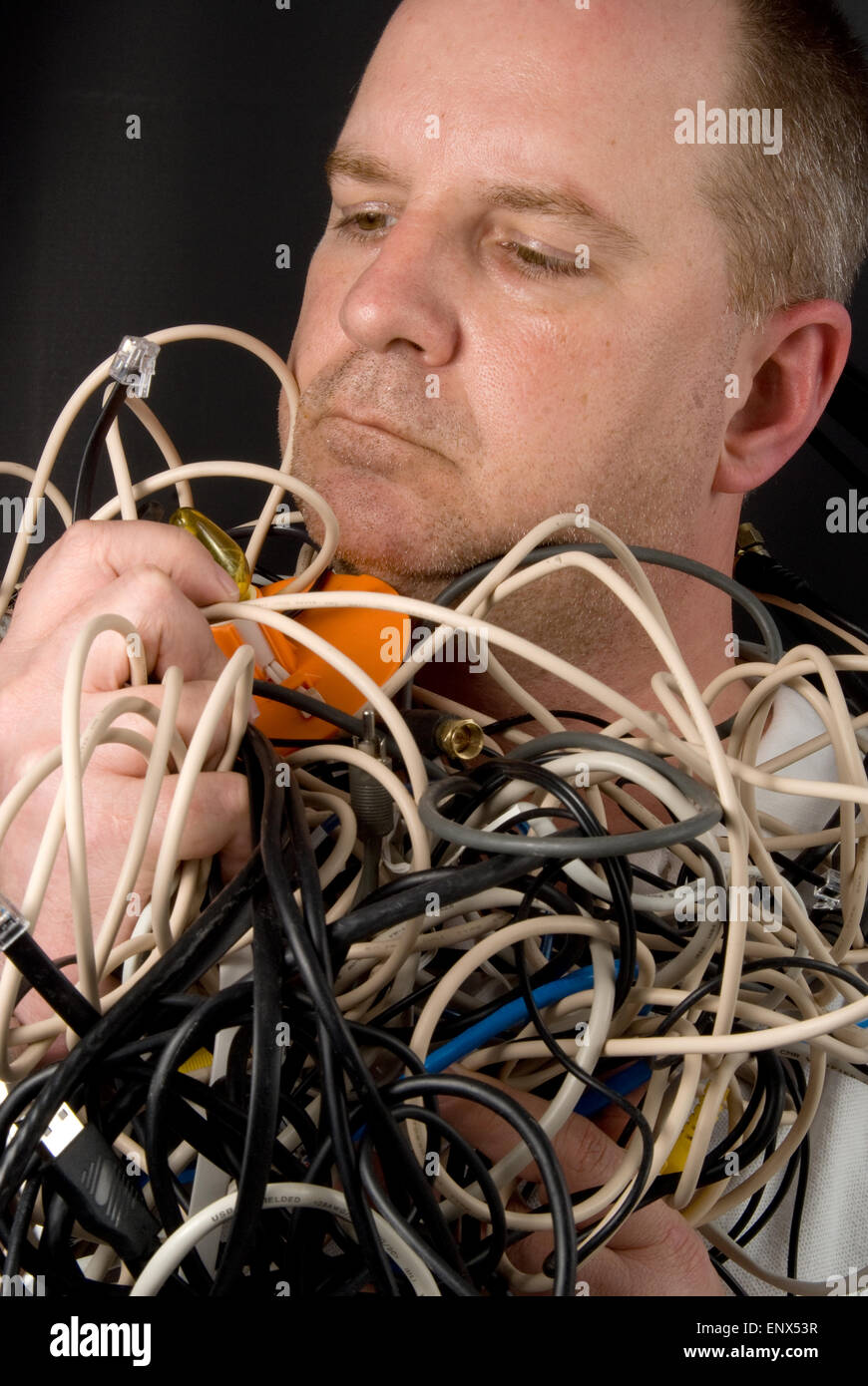 Strangled Wires Man Tangled in Wires Stock Photo - Alamy