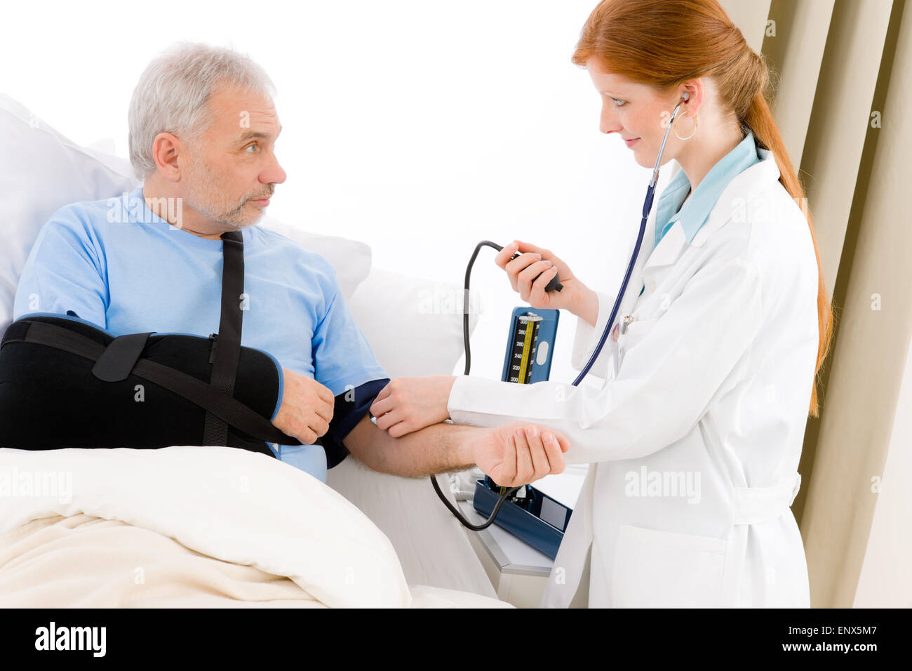 Hospital doctor check blood pressure patient Stock Photo Alamy
