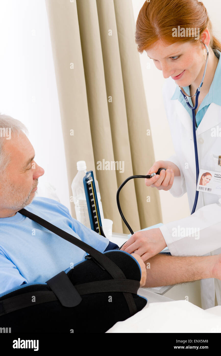 Hospital doctor check blood pressure patient Stock Photo Alamy