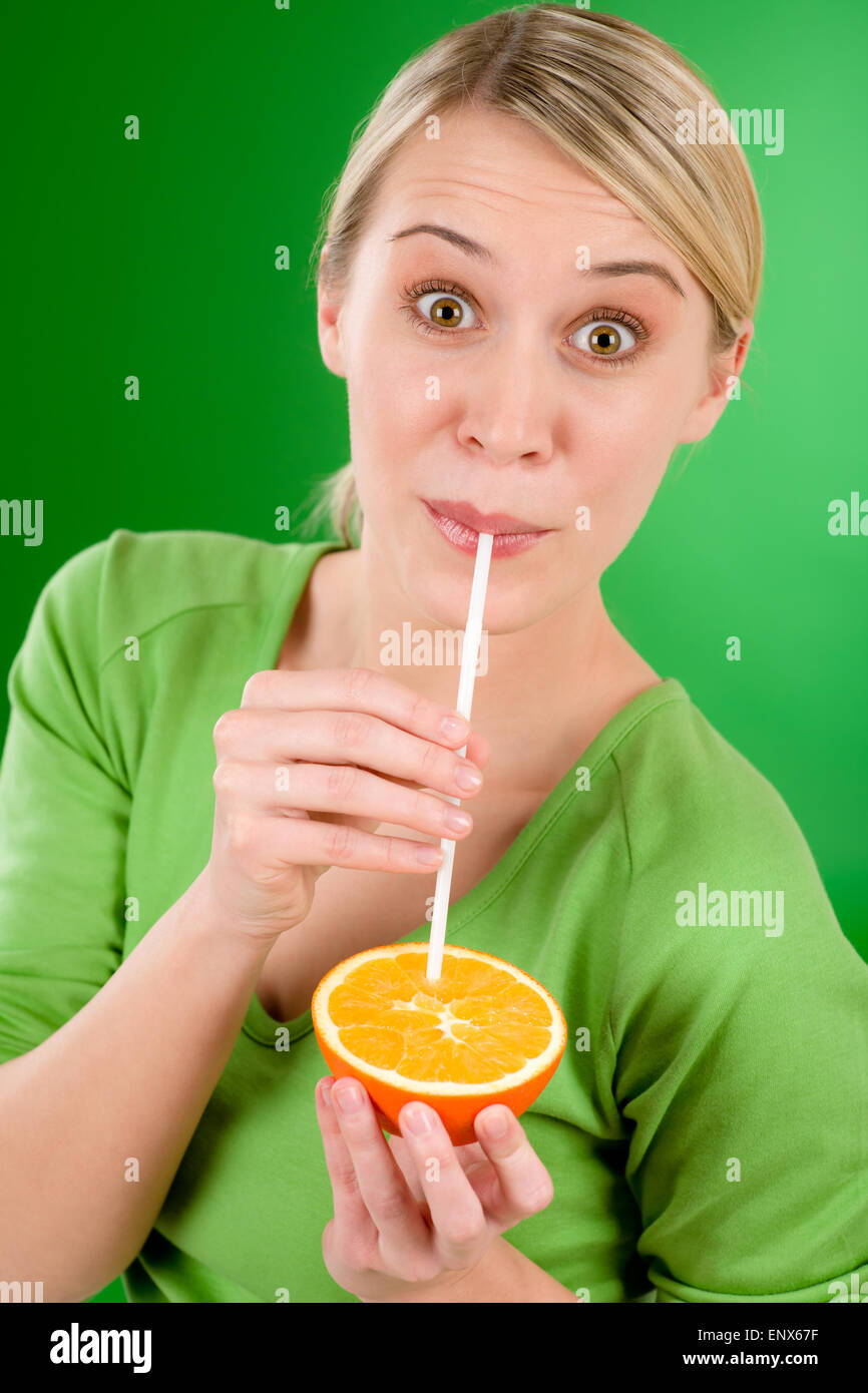 Healthy lifestyle woman drink juice from orange Stock Photo Alamy