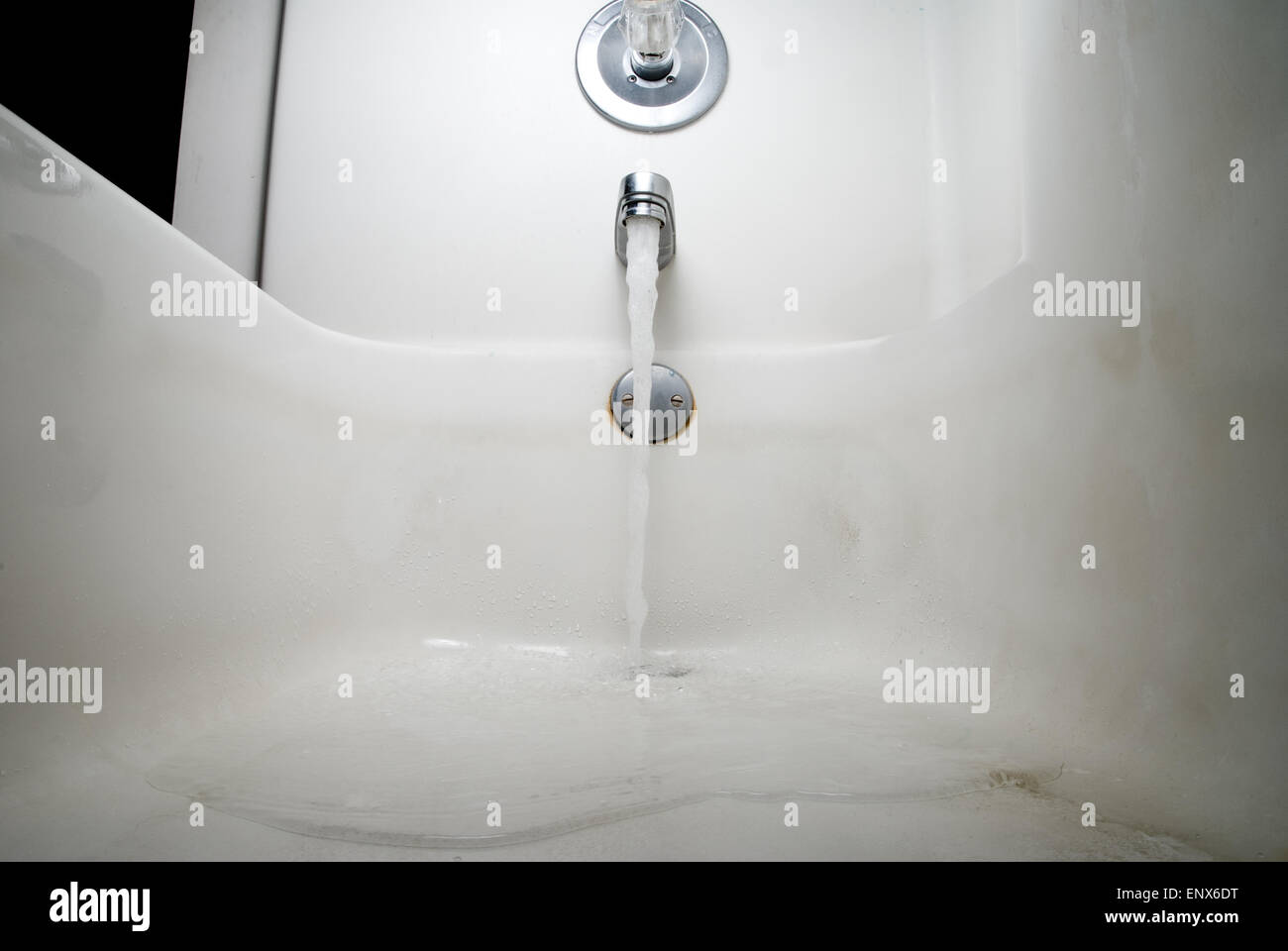 https://c8.alamy.com/comp/ENX6DT/dirty-bathtub-with-water-ENX6DT.jpg