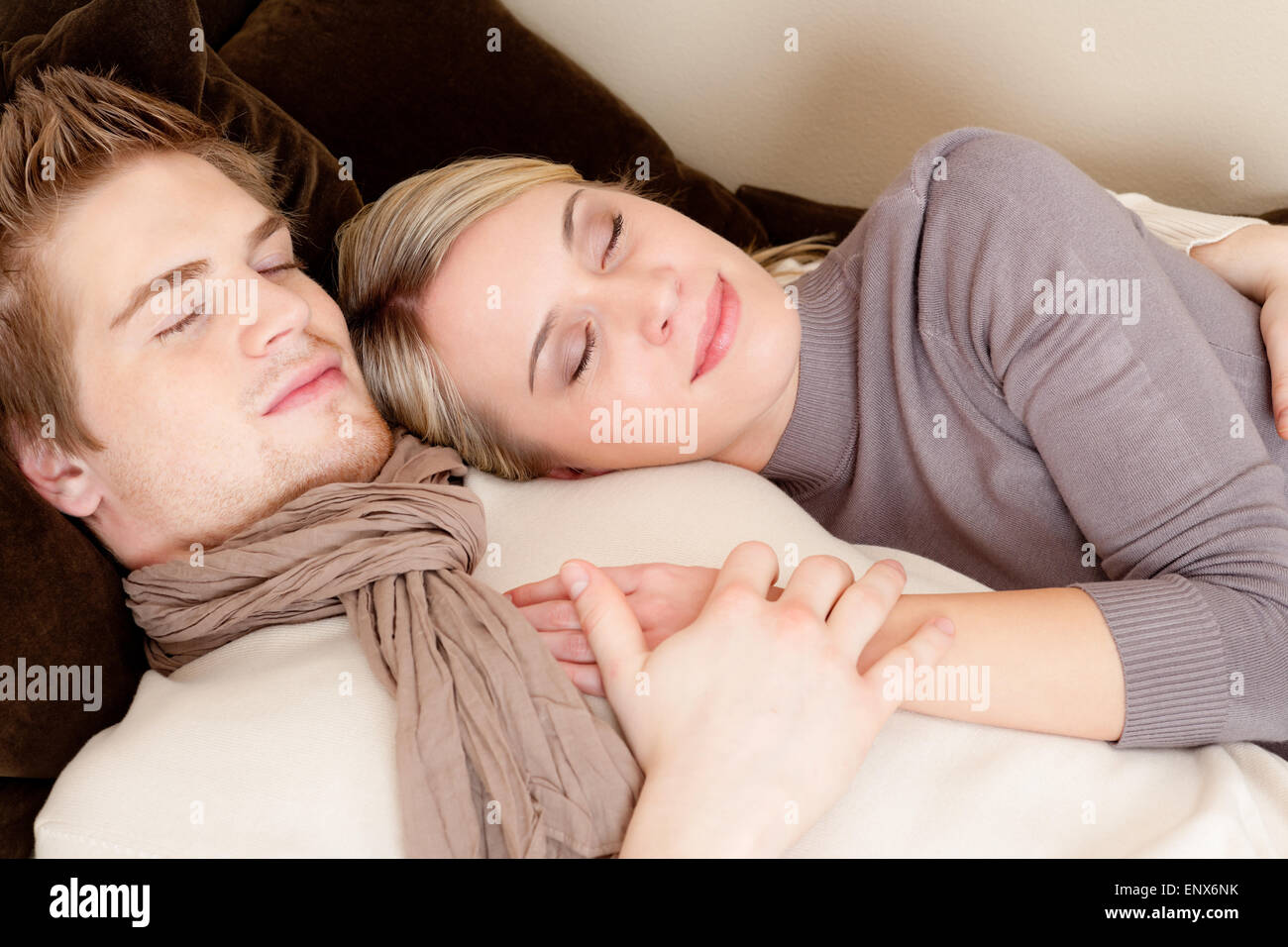 Couple in love - happy relax at home together Stock Photo - Alamy