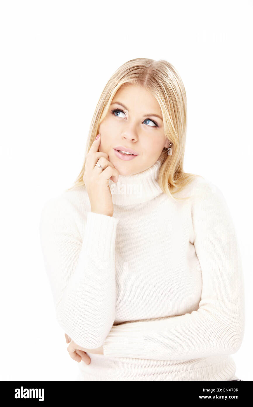 Portrait of the thoughtful blonde isolated on a white background Stock Photo