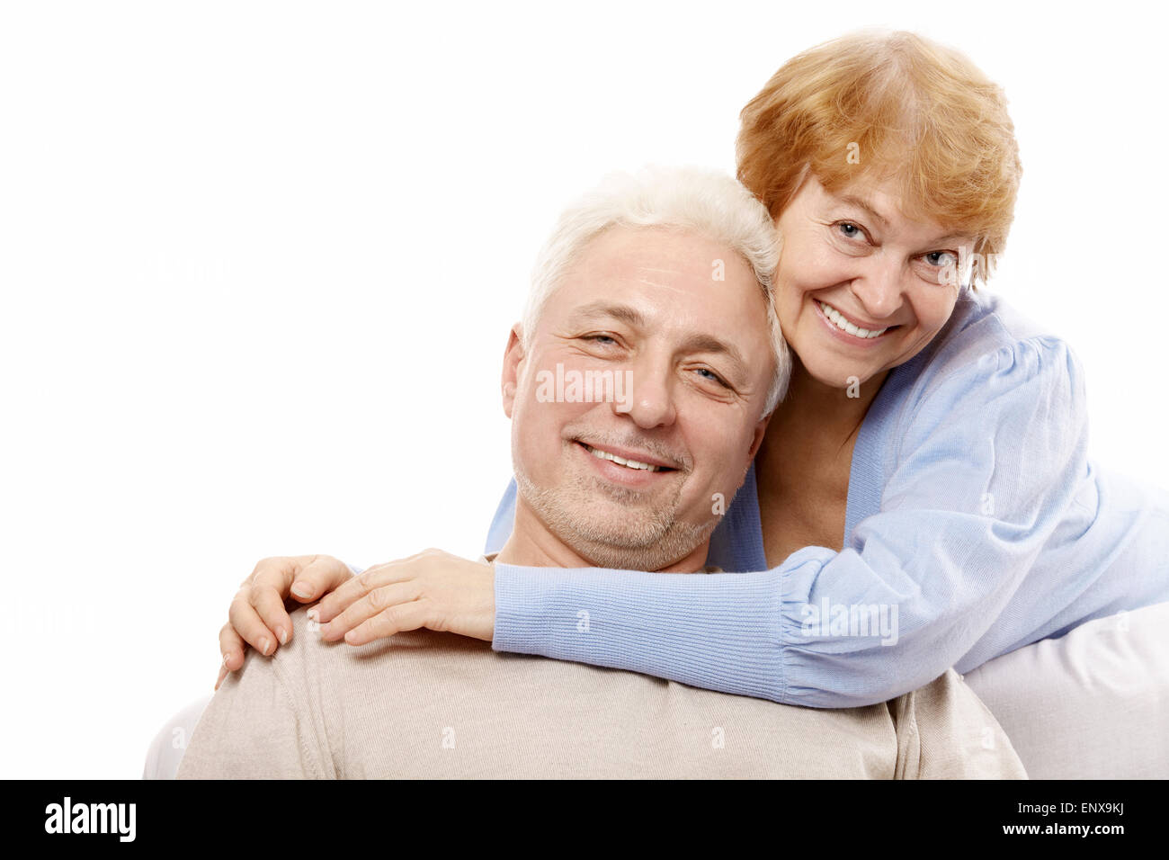 Happy spouses of advanced age on a white background Stock Photo