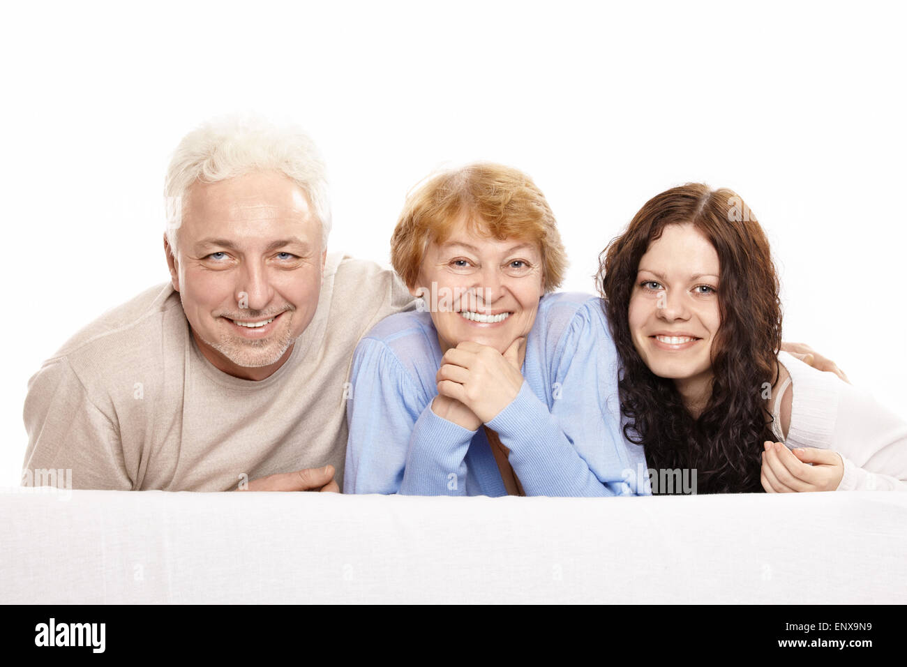 Family from three persons on a white background Stock Photo