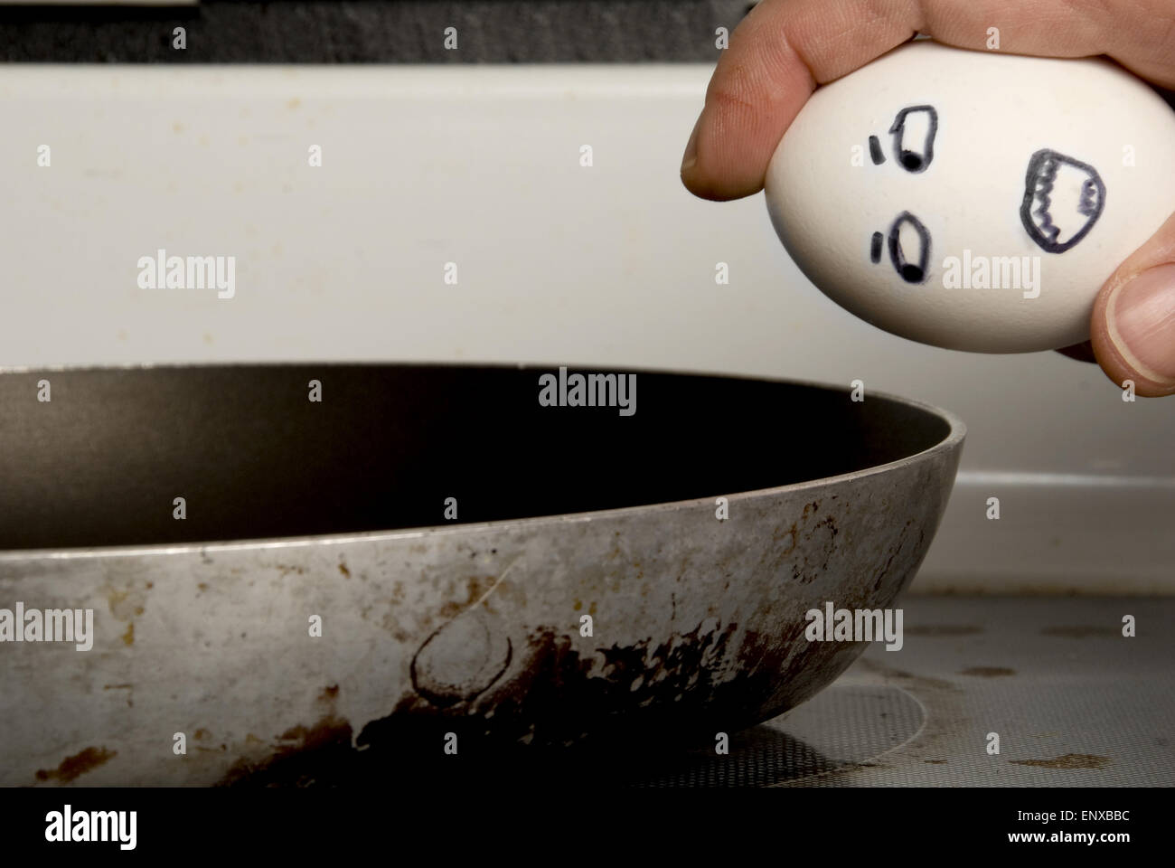 Breaking an Egg Stock Photo Alamy