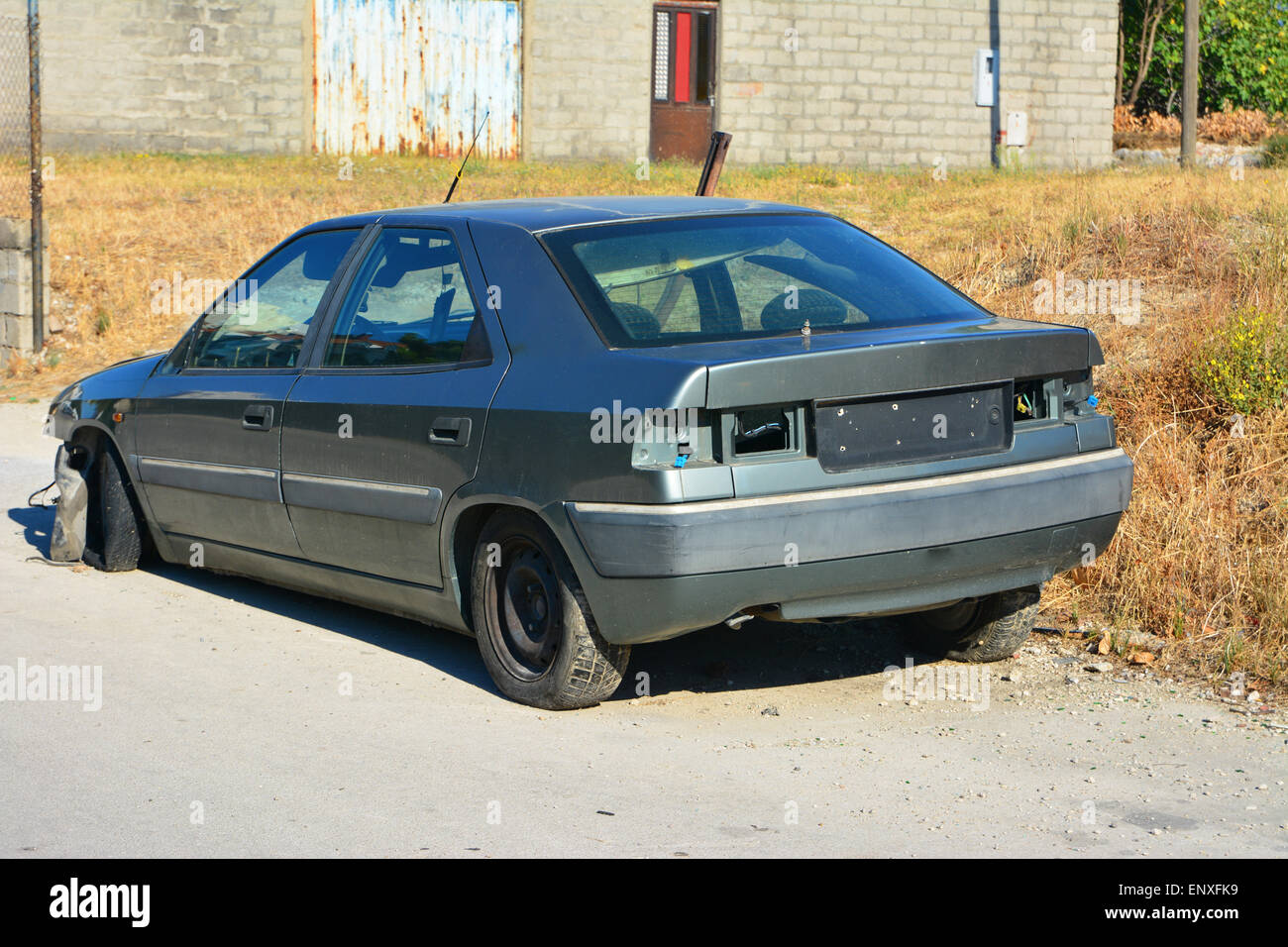 abandoned car near the road Stock Photo - Alamy