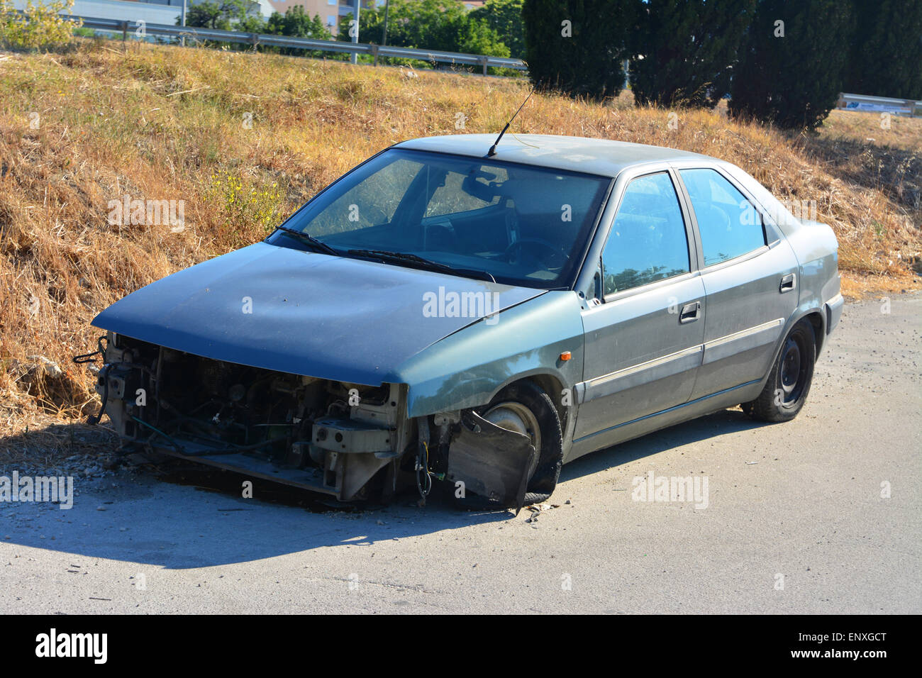 Abandoned car near the road Stock Photo - Alamy