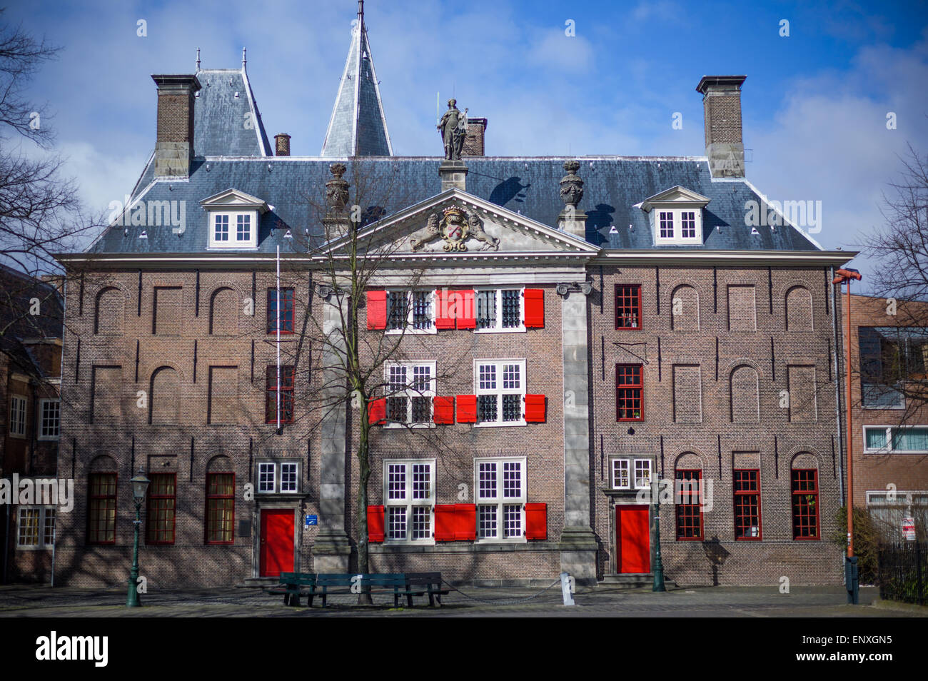 European Building in Leiden, Netherlands, with red shutters Stock Photo