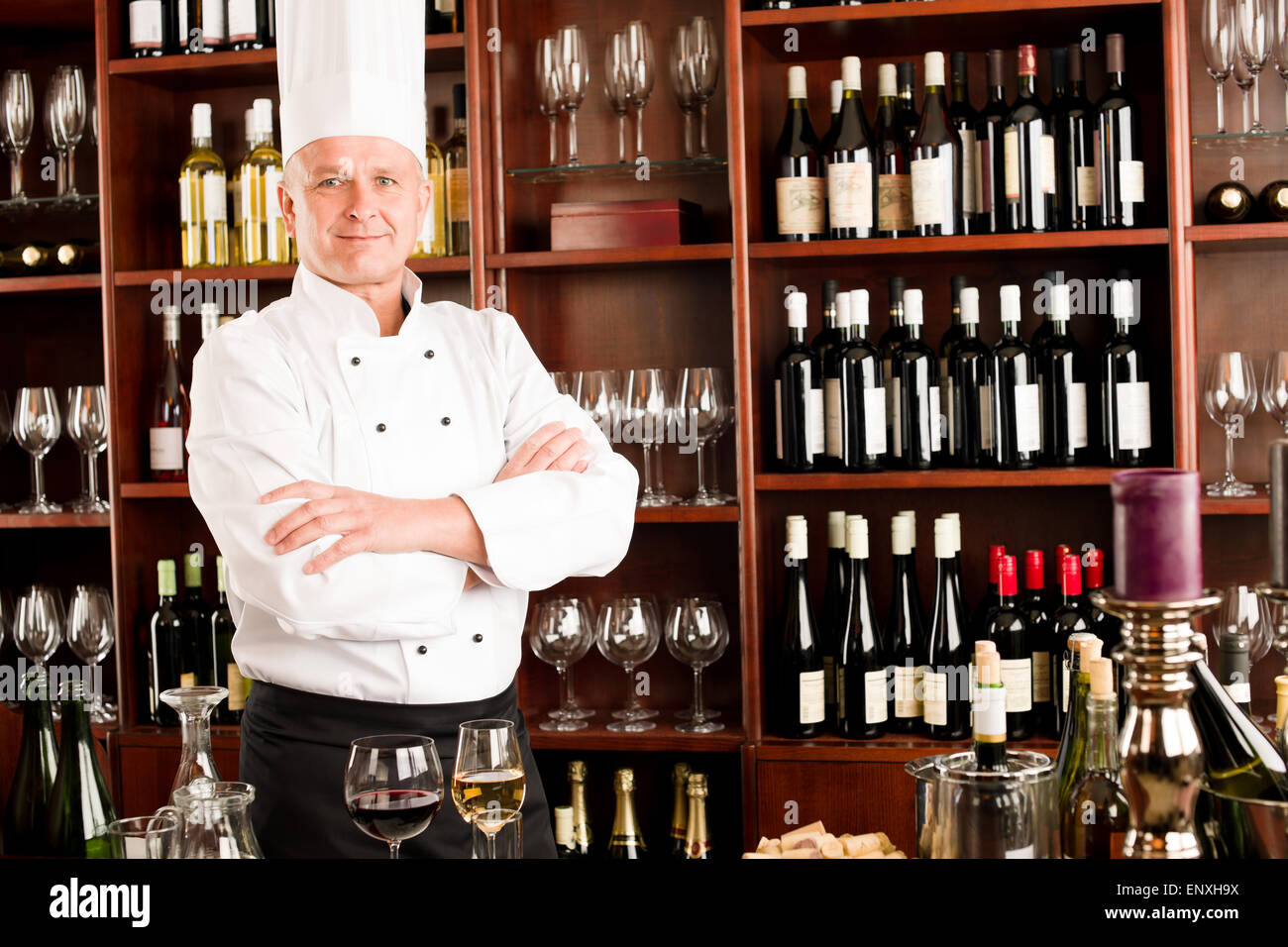 Chef cook confident professional posing restaurant Stock Photo