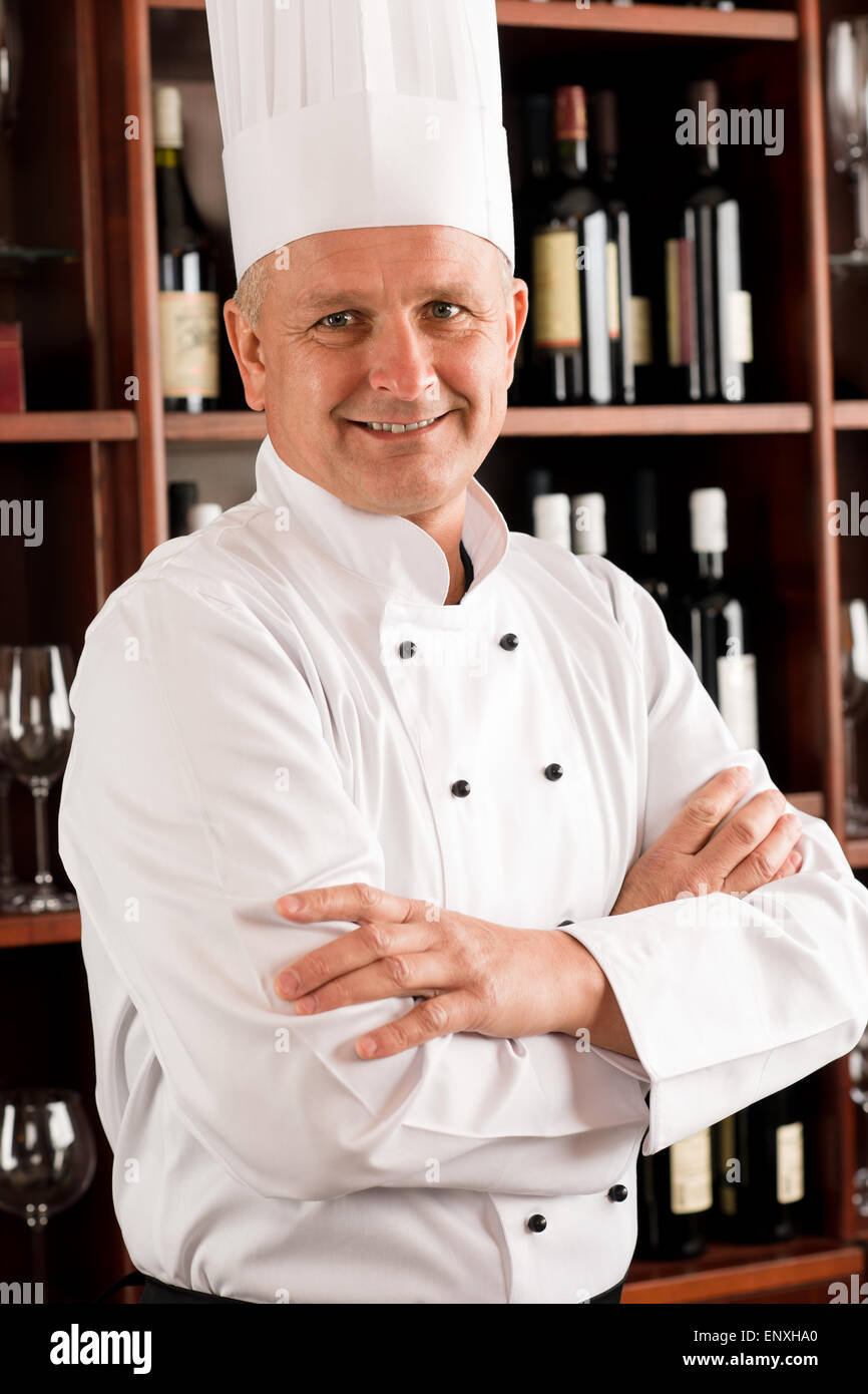 Chef cook confident professional posing restaurant Stock Photo
