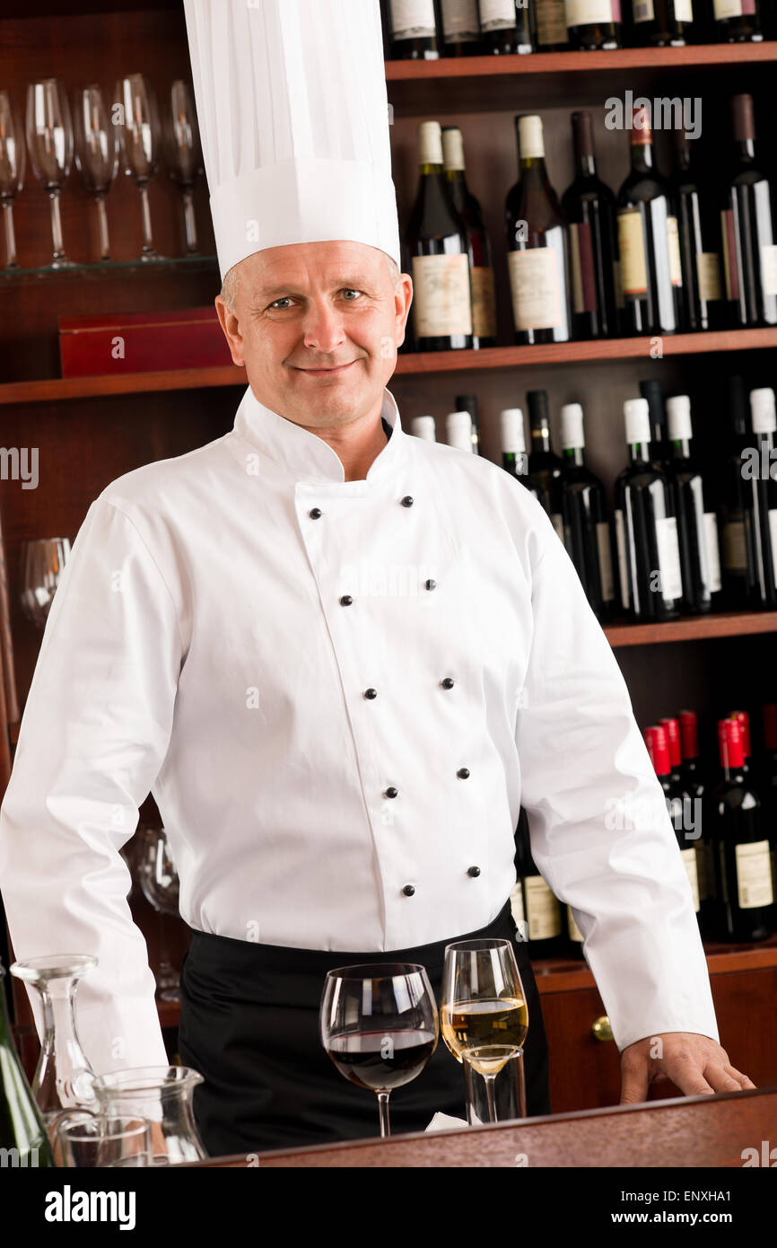 Chef cook wine bar standing confident restaurant Stock Photo