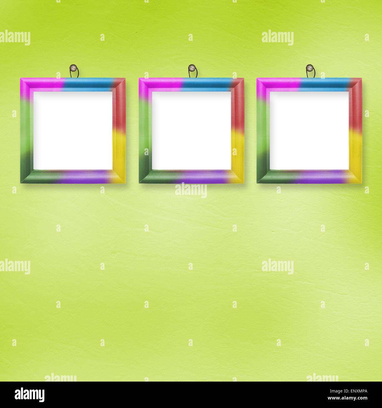 Multicolored bright frames hanging on the abstract pastel background ...