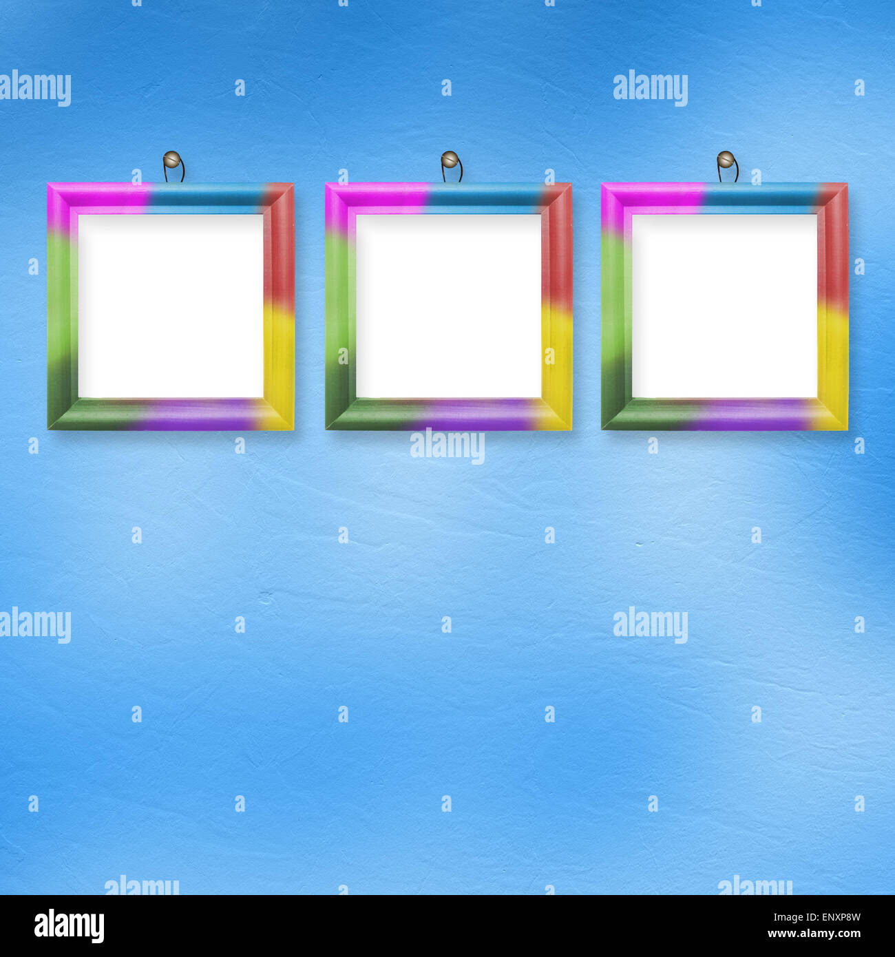 Multicolored bright frames hanging on the abstract pastel background ...