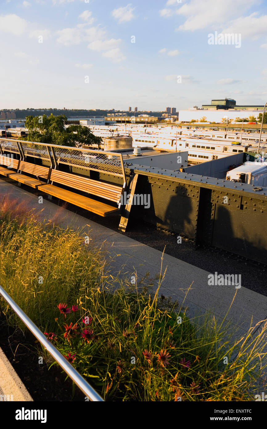 USA, New York, Manhattan, deserted northern section of the High Line linear park on the disused elevated West Side Line railroad beside the Hudson Rail Yards with trains in Midtown. Stock Photo