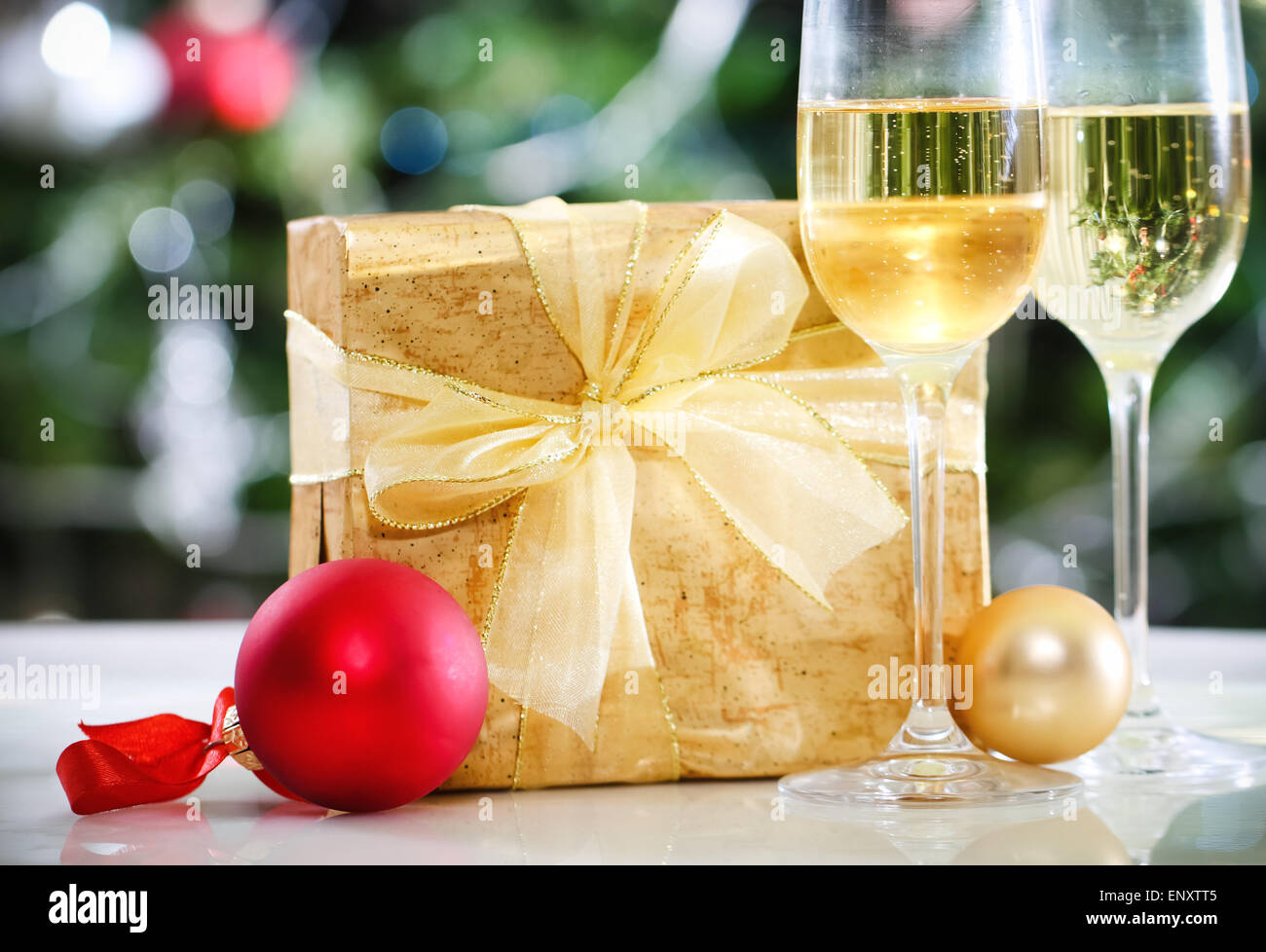 Glasses of champagne and Christmas decorations Stock Photo - Alamy